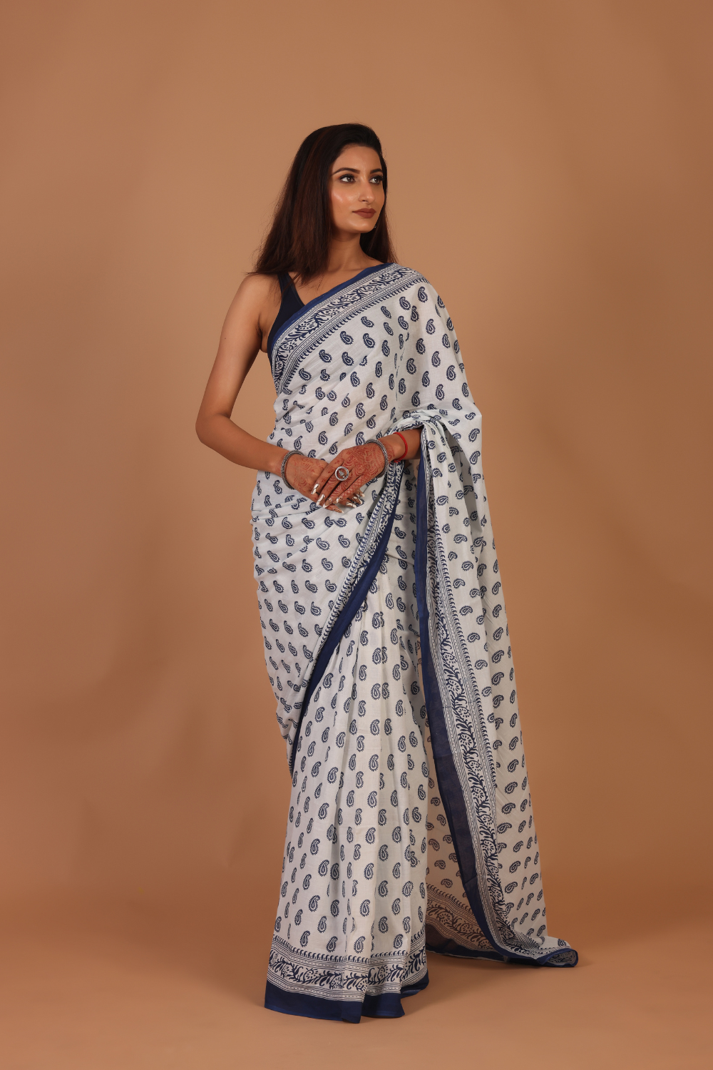 Elegant White Saree with Navy Blue Traditional Prints