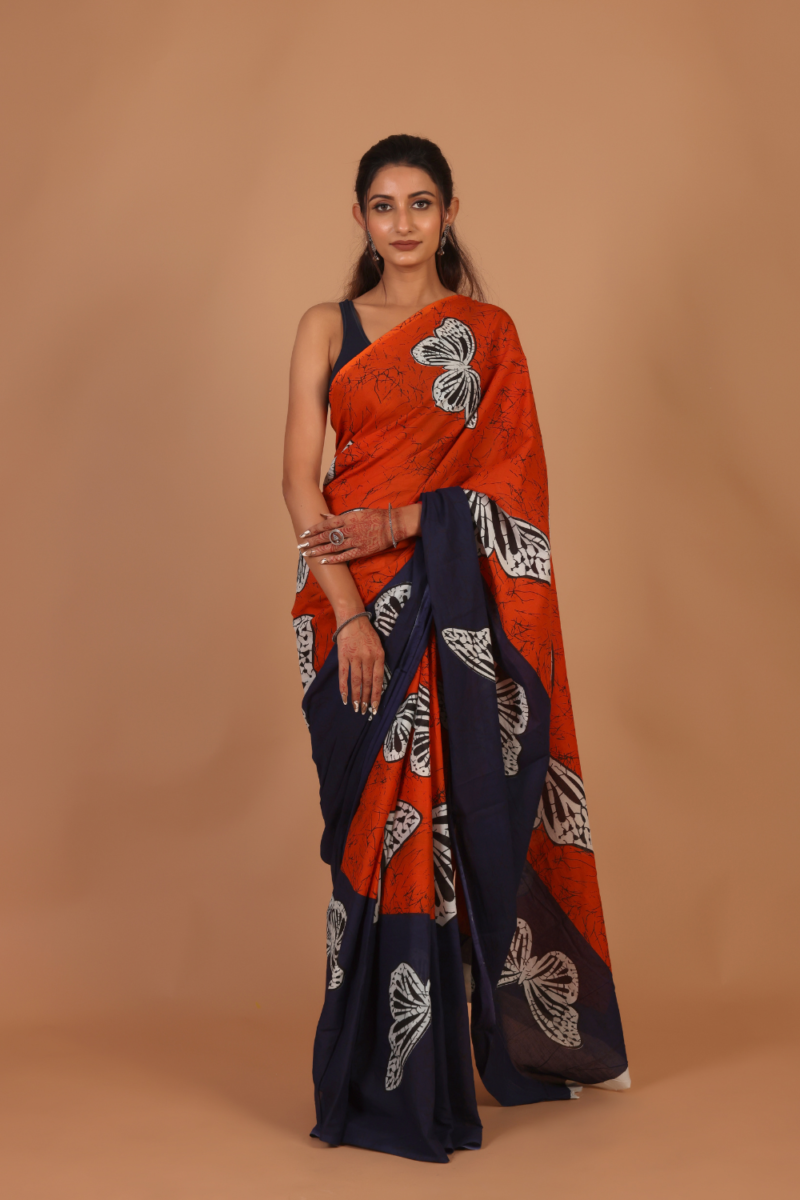 Vibrant Scarlet Saree with Black Butterfly Pattern – Bold, Unique & Stylis